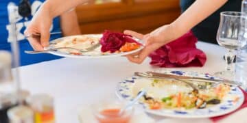 Helping the waiter clear the table reveals deep traits of your character