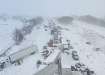 Drivers remain stranded after 100-car pileup caused by heavy snowfall in Michigan