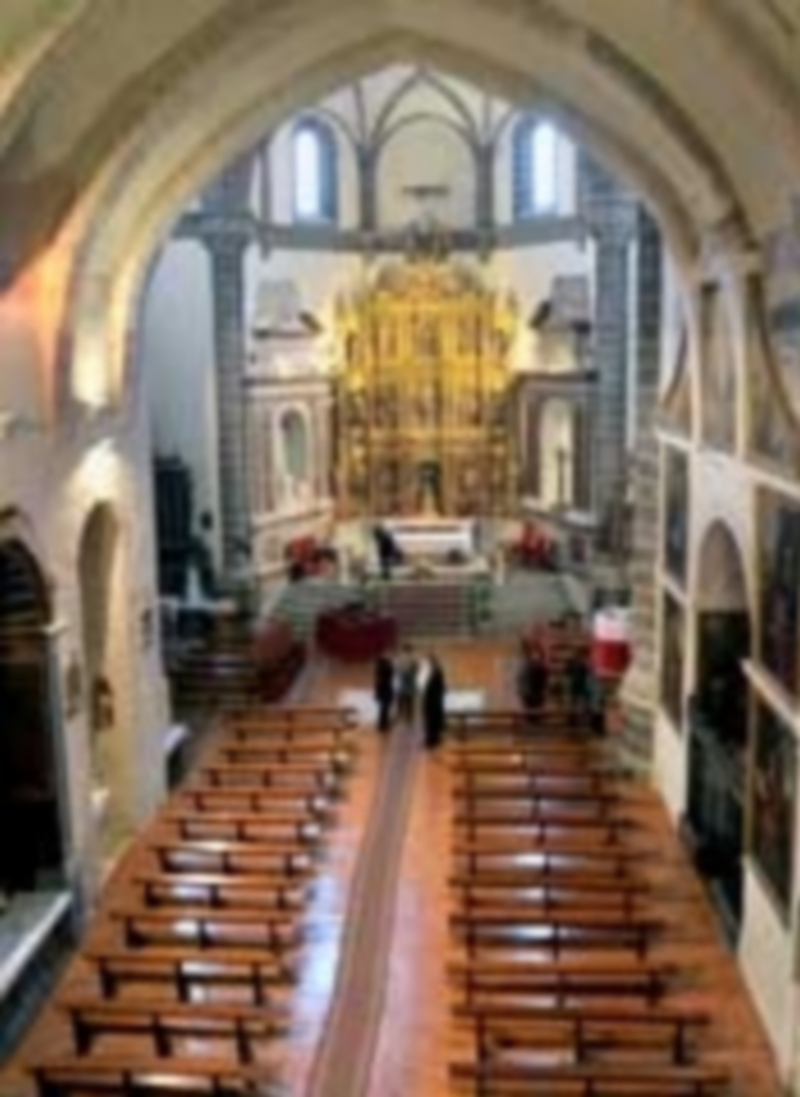 El cuadro de El Greco se expone en un lateral de la iglesia de Martín Muñoz. / Kamarero