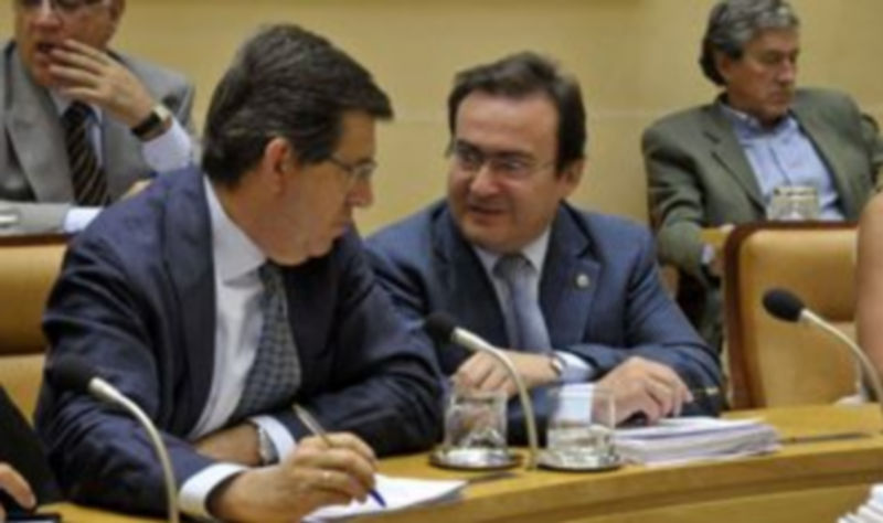 Postigo junto al viceportavoz del PP