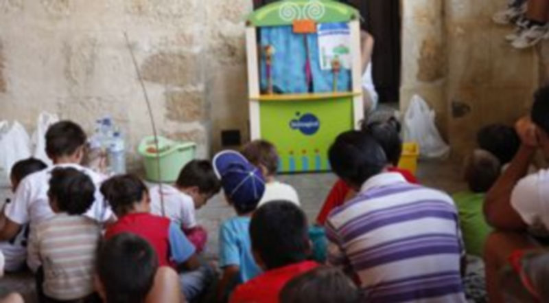 Numerosos niños se dieron cita en la Plaza de San Lorenzo en el día inaugural de la Semana Cultural./ Diego de Miguel