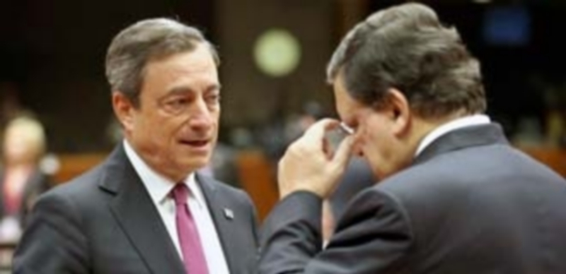 Mario Draghi (izquierda)