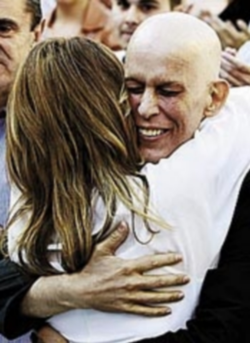 Susana Díaz se abraza a Zerolo.