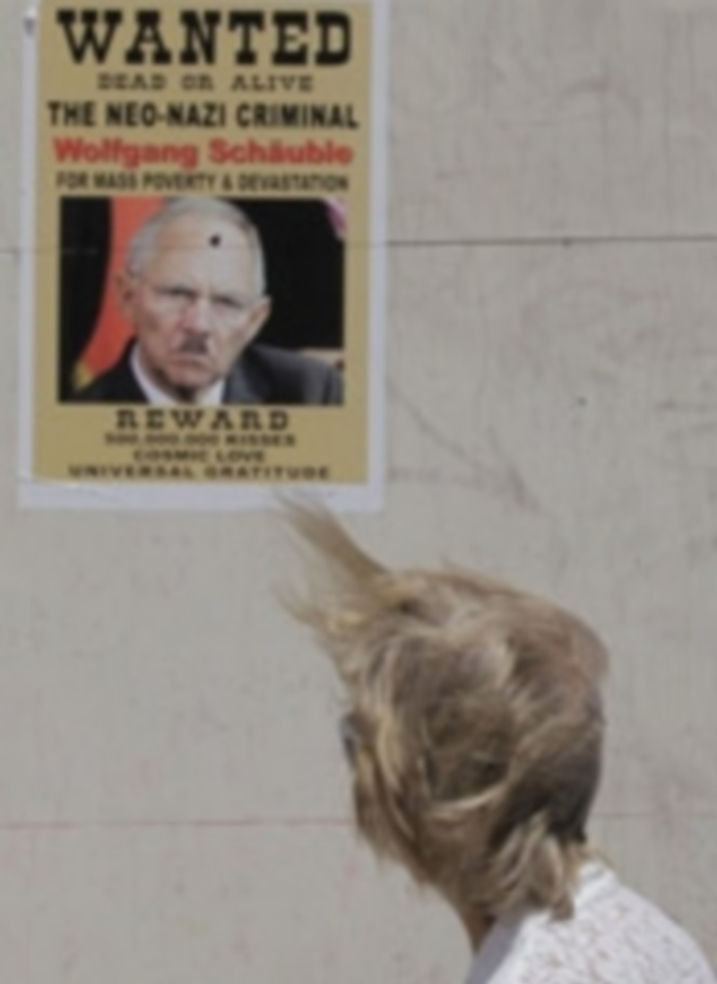 Un cartel contra el ministro de Finanzas alemán en las calles de Atenas. / EFE