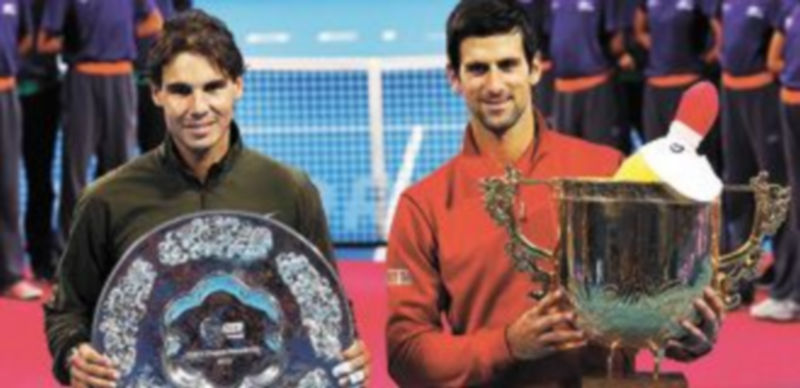 Rafa Nadal y Novak Djokovic posan con sus trofeos de subcampeón y campeón