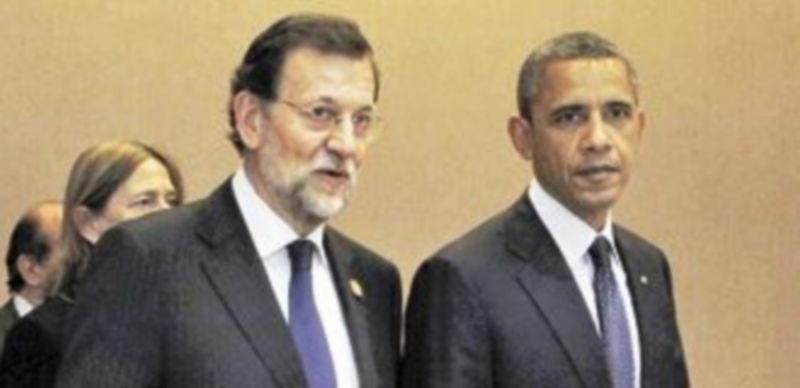Rajoy y Obama conversan amistosamente en la Cumbre de Seguridad Nuclear organizada por la OTAN en Seúl. / Reuters