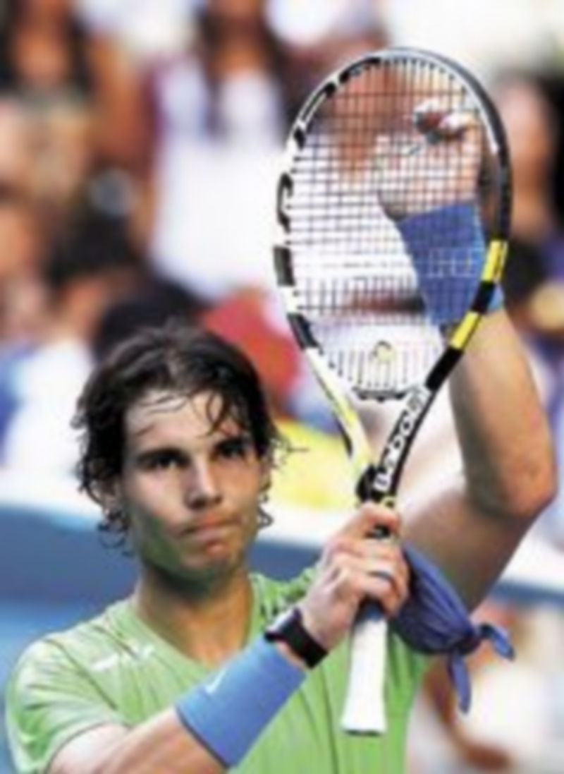 Nadal aplaude tras pasar a la siguiente ronda. / Reuters.