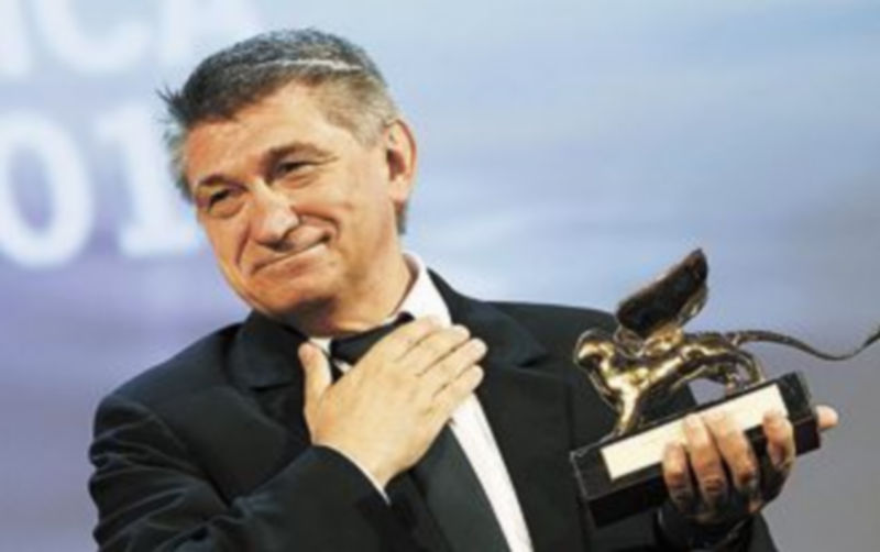 El director ruso recoge el máximo reconocimiento del festival italiano. / Reuters.
