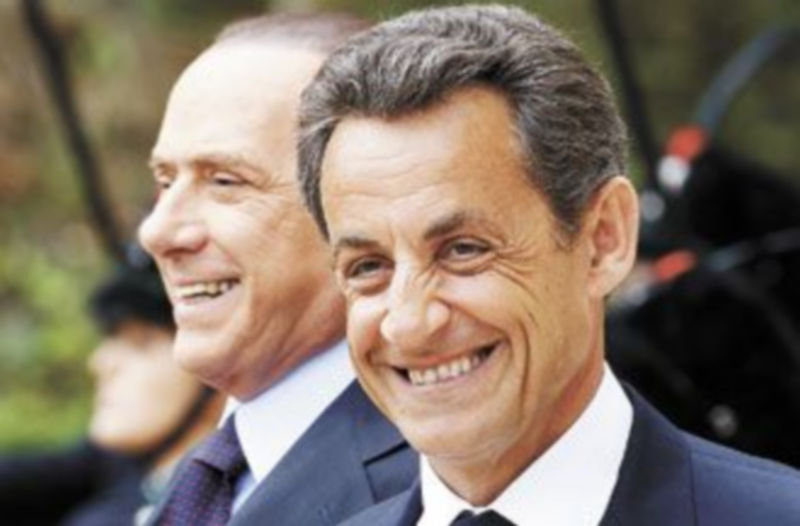 Silvio Berlusconi (i) y Nicolas Sarkozy mantuvieron una reunión en Roma para tratar de solucionar sus diferencias. / Reuters.