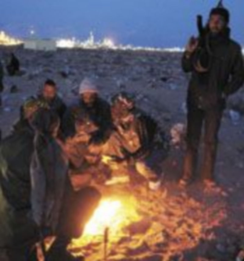 Decenas de hombres armados recorren Trípoli cada noche. /Reuters