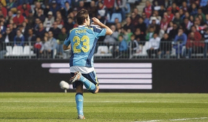 Sevilla late a ritmo de Champions 1 Coke celebra el gol que supuso el 0-2 definitivo para el Sevilla en el partido que le enfrentó al Almería. / EFE