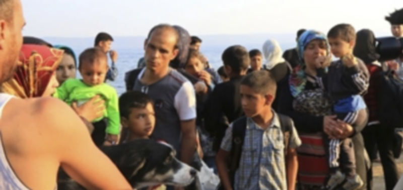 Inmigrantes sirios tras su llegada a las costas de Grecia por mar. / EFE