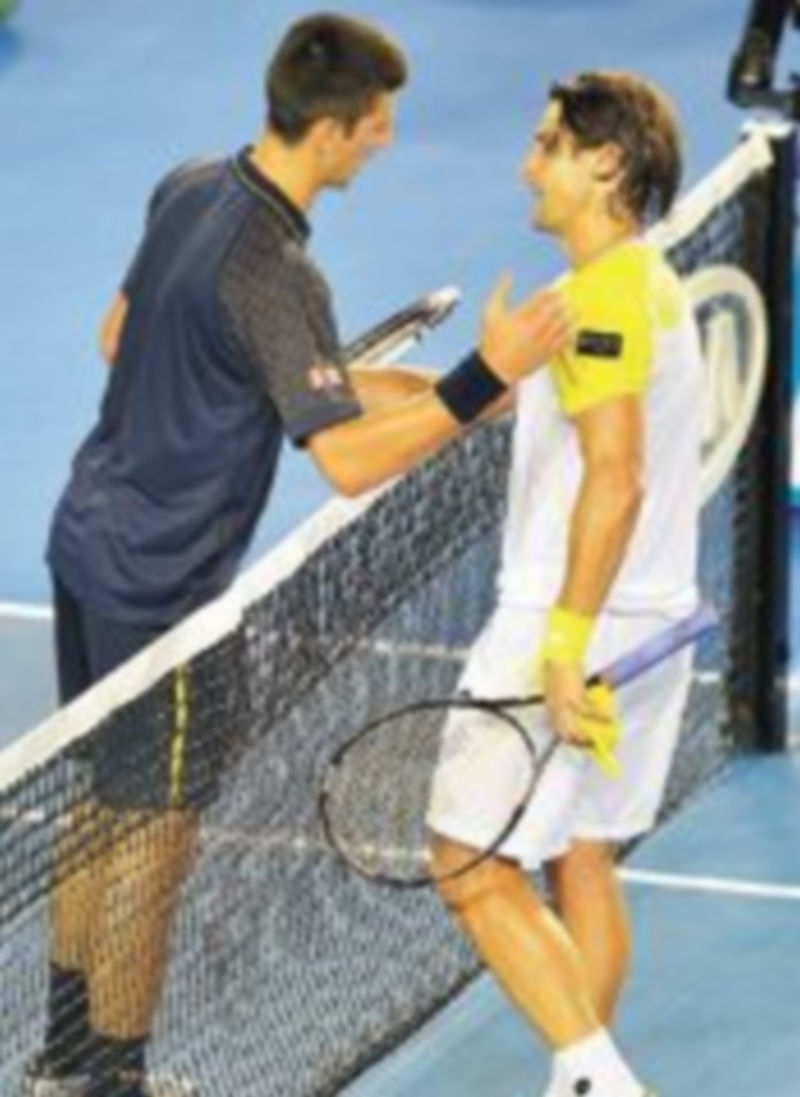 Djokovic y Ferrer se saludan
