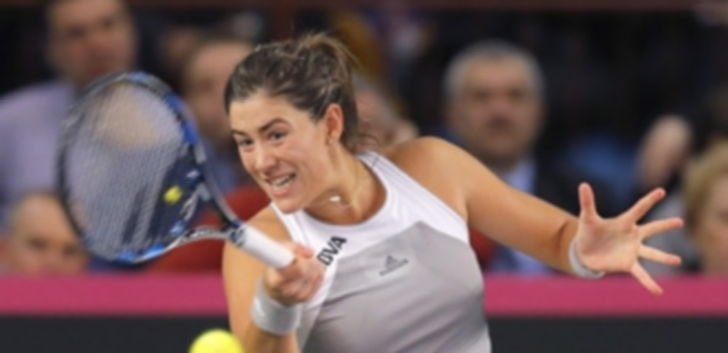 Garbiñe Muguruza ganó sus dos partidos individuales. / EFE