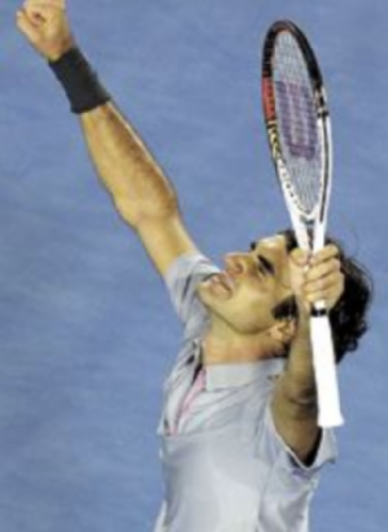 Federer festeja su trabajado triunfo en cuartos. / AFP