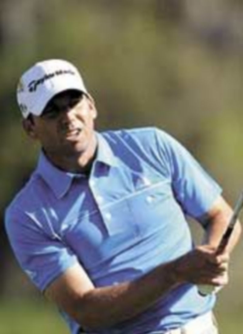 Sergio García mantuvo el liderato a pesar del aplazamiento de la última jornada por la lluvia. / Reuters