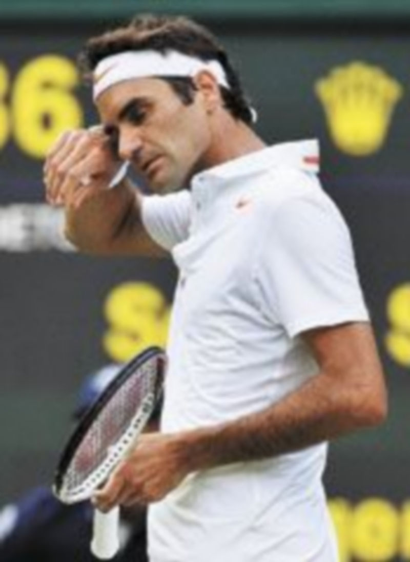 Federer se lamenta tras perder un punto. / T. Melville (Efe)