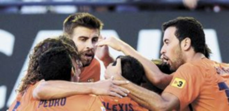 Busquets aseguró que la diferencia de puntos con el Real Madrid no influirá en el rendimiento del equipo. / Reuters