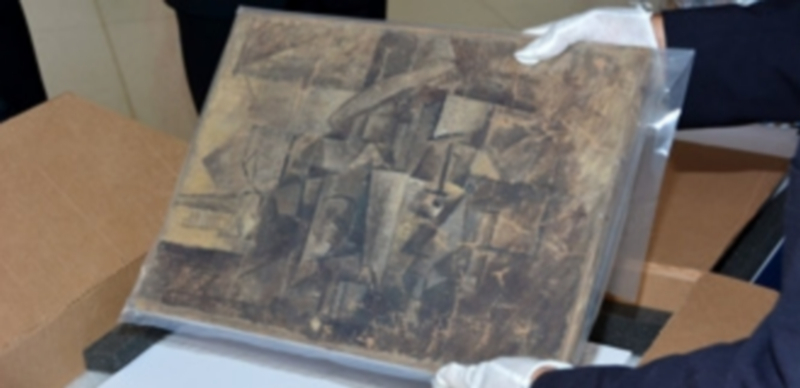 El cuadro fue interceptado en un paquete de regalo navideño enviado desde Bélgica y etiquetado como un juguete. / EFE