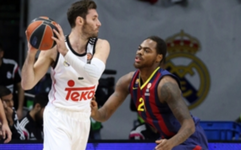 Rudy Fernández (izquierda) fue el jugador más destacado del partido. / EFE