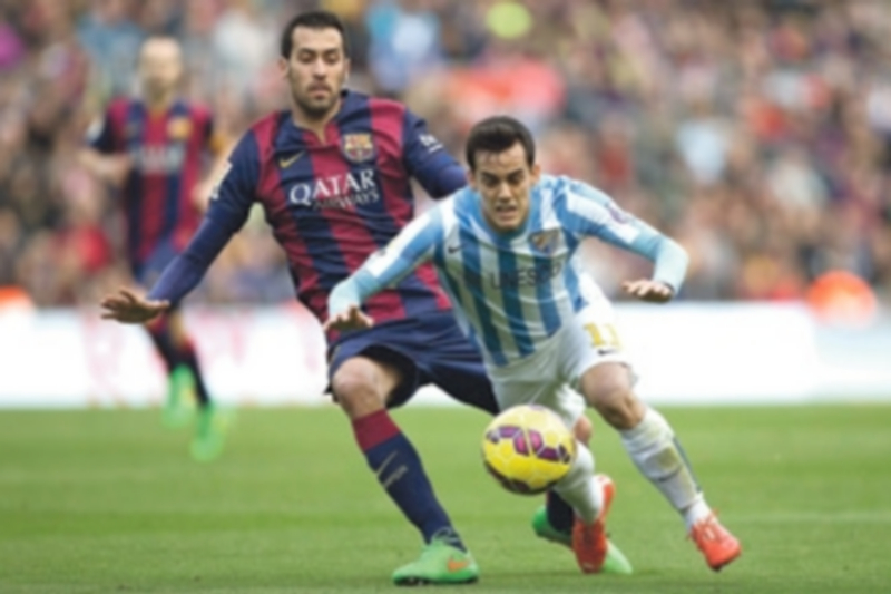 Sergio Busquets presiona a Juanmi en el último partido liguero disputado en el Camp Nou