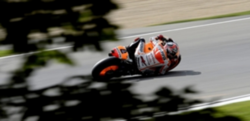 El piloto español  de Repsol-Honda durante la clasificación en el Gran Premio de la República Checa en el que consiguió su novena pole en lo que va de temporada.  / Efe