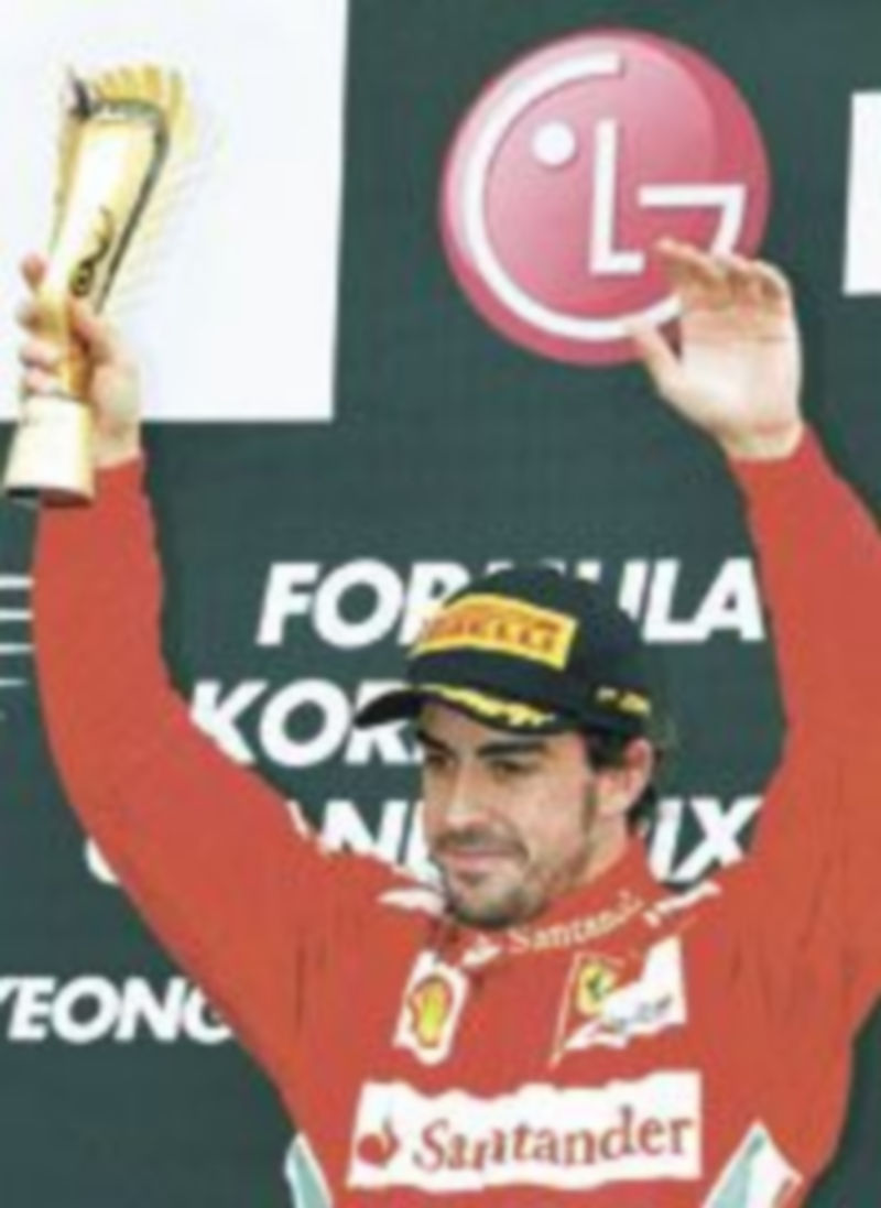 Alonso se mostró satisfecho con el tercer puesto. / L. J. (Reuters)