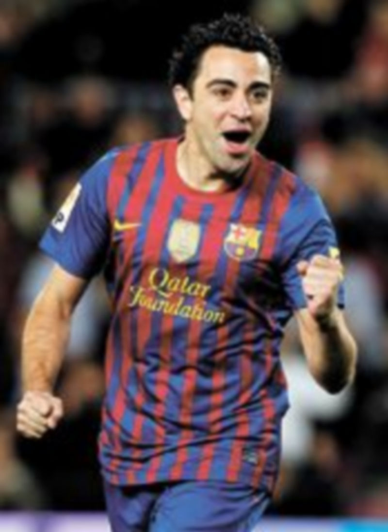 Xavi aseguró que Iniesta «merece» conquistar el Balón de Oro. / Reuters