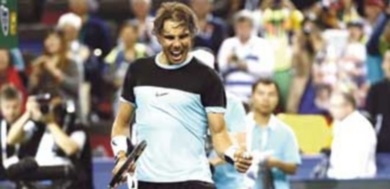 Rafa Nadal celebra su triunfo sobre Milos Raonic en el Masters de Shanghai. / EFE