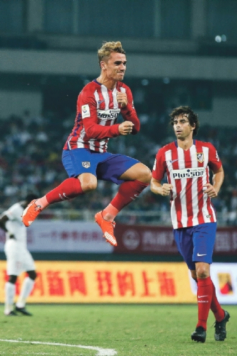 Griezmann (izquierda)