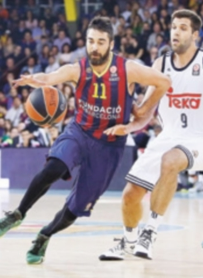 Navarro (i) y Reyes vivirán un partido especial en el Palacio de los Deportes. / EFE