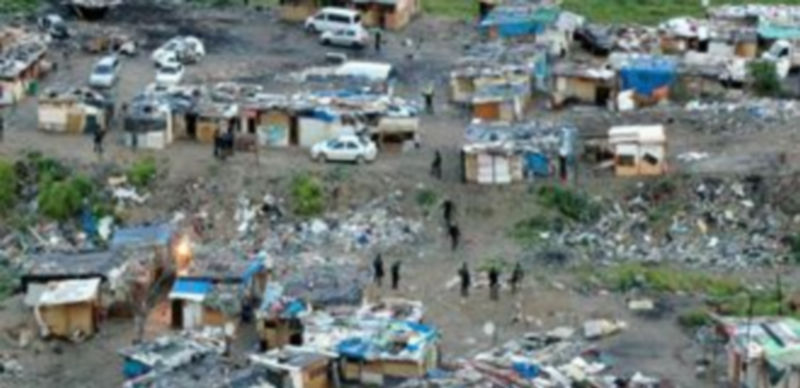 Entre chabolas y mansiones 1 Imagen aérea de uno de los poblados en los que vivían los detenido y desde donde se trasladaban a robar. / Guardia Civil