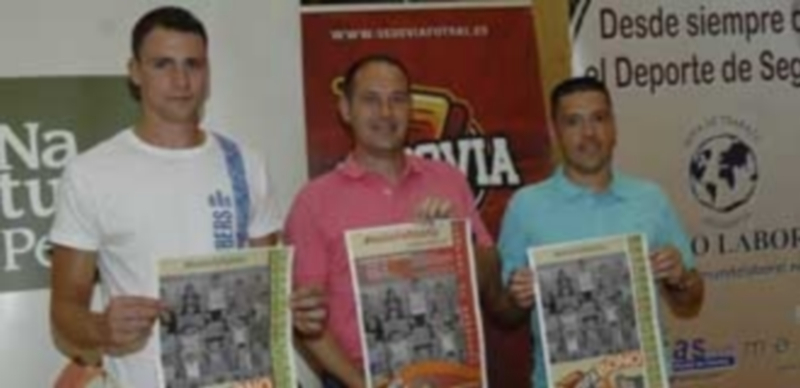 Personal del Naturpellet Segovia en el pabellón Pedro Delgado. / Elena Peña