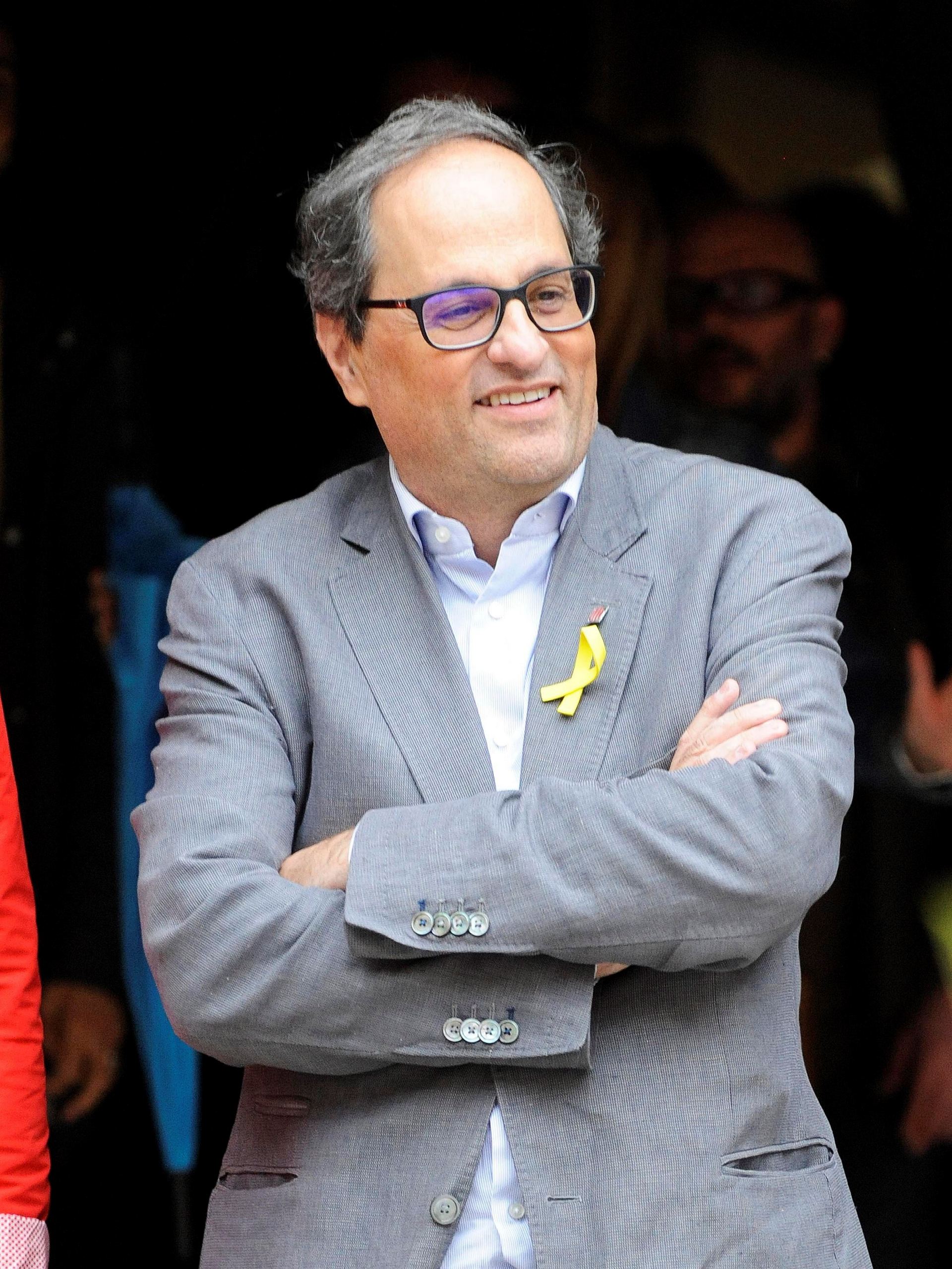 El presidente de la Generalitat, Quim Torra, posa ante la prensa.