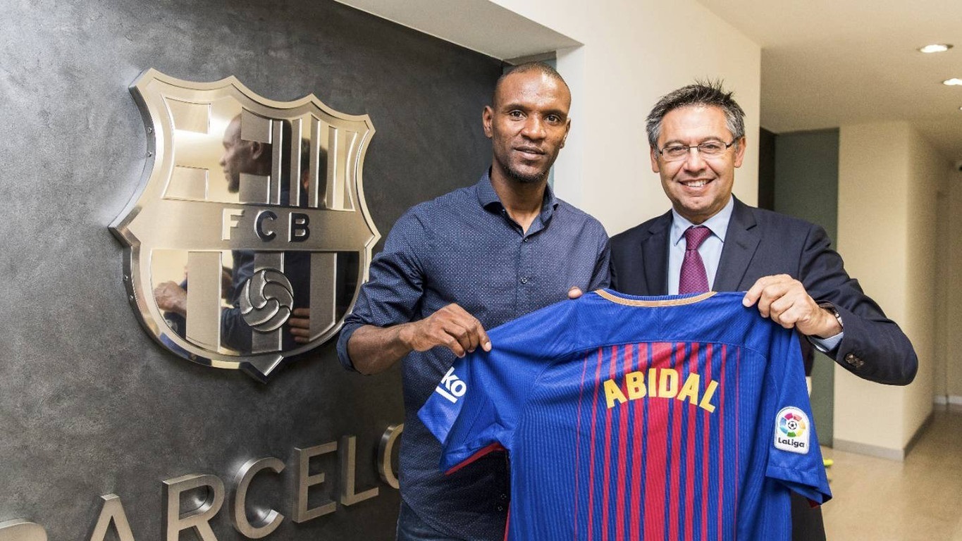 Abidal, junto a Bartomeu en una imagen de archivo.