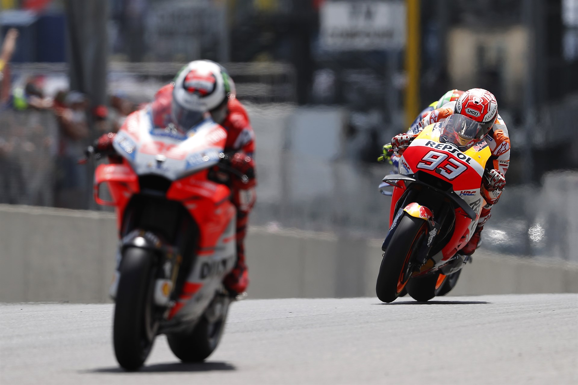 Marc Márquez persigue a Jorge Lorenzo en el pasado Gran Premio de Austria.