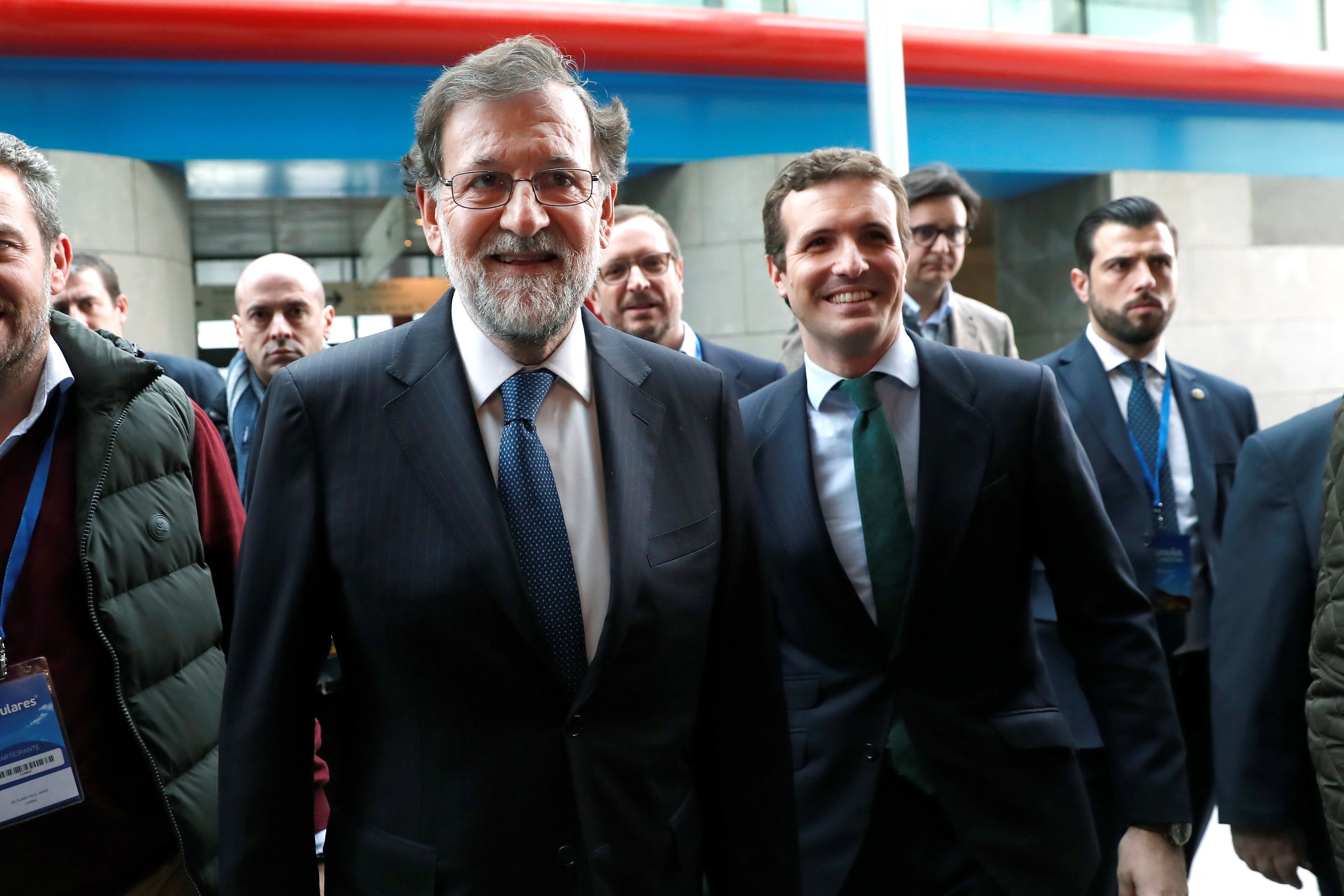 El expresidente del gobierno Mariano Rajoy y el presidente del PP Pablo Casado en la pasada convención del grupo.