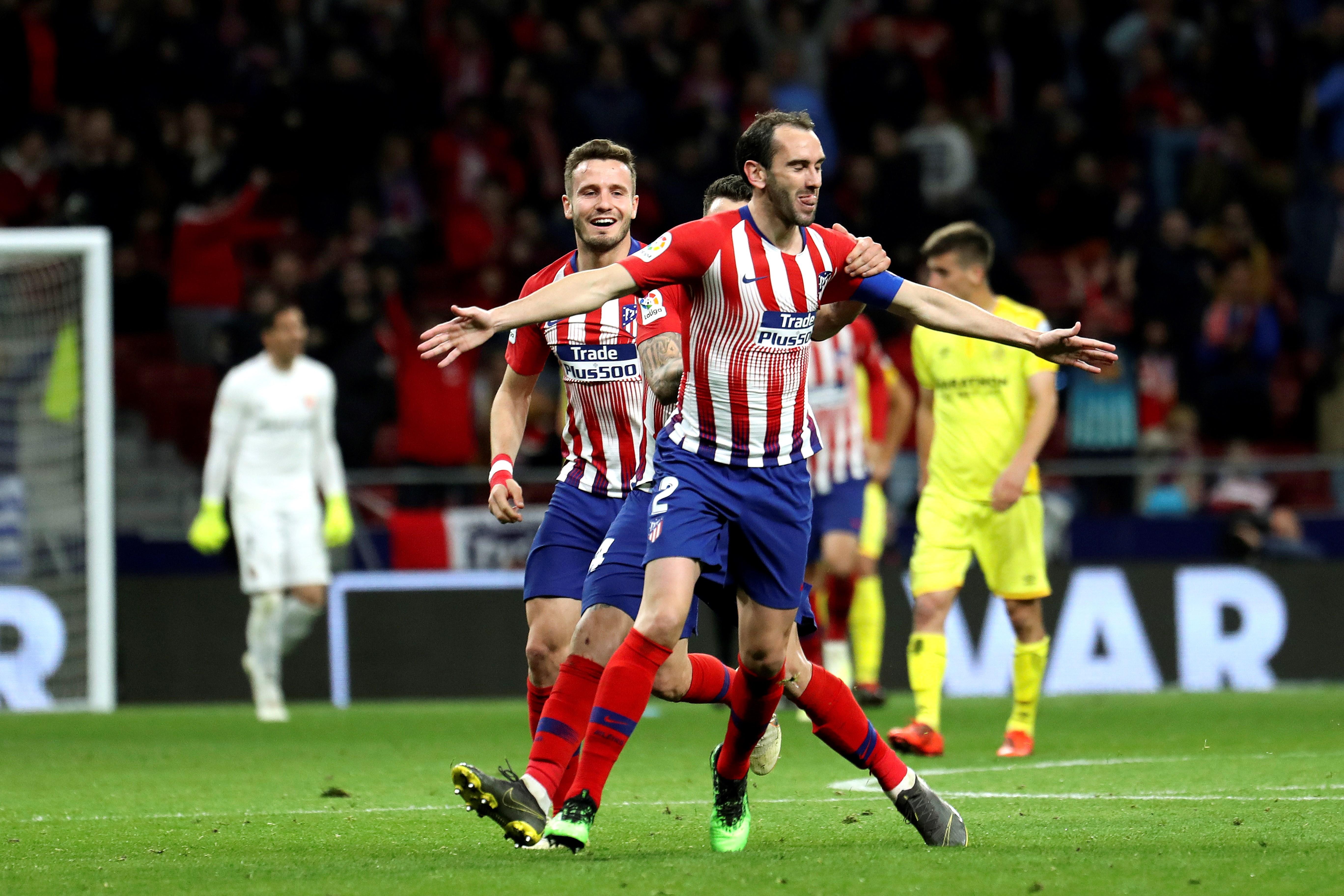 El defensa uruguayo del Atlético de Madrid Diego Godín celebra su gol anotado ante el Girona.