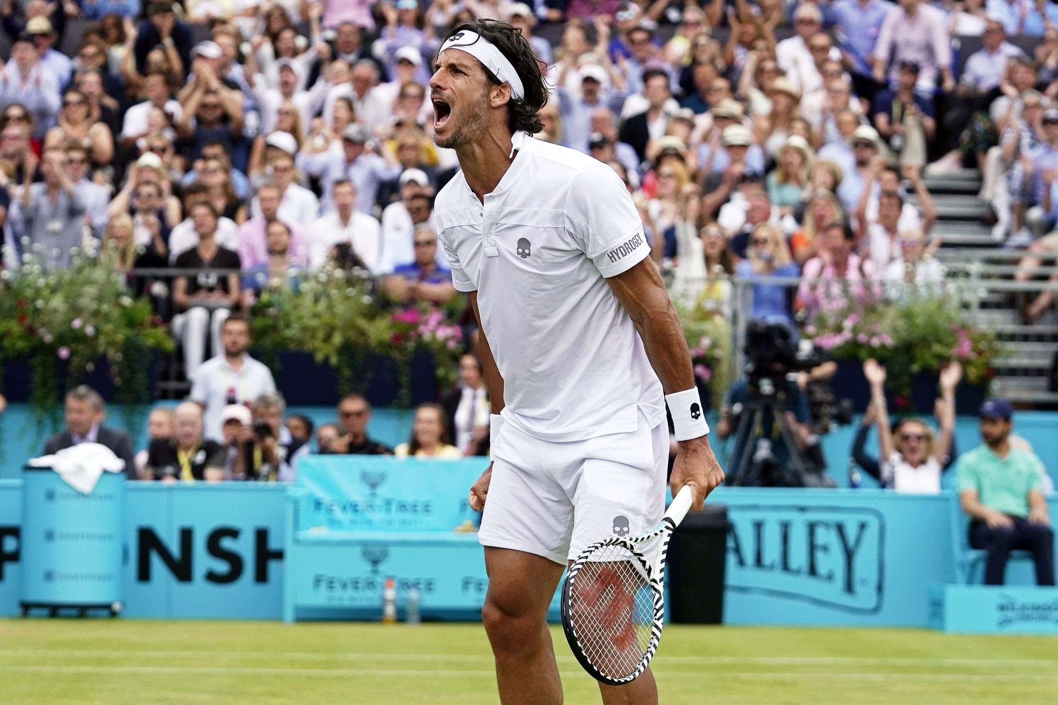 Feliciano López celebra su victoria en la final individual del torneo de Queen’s. / EFE
