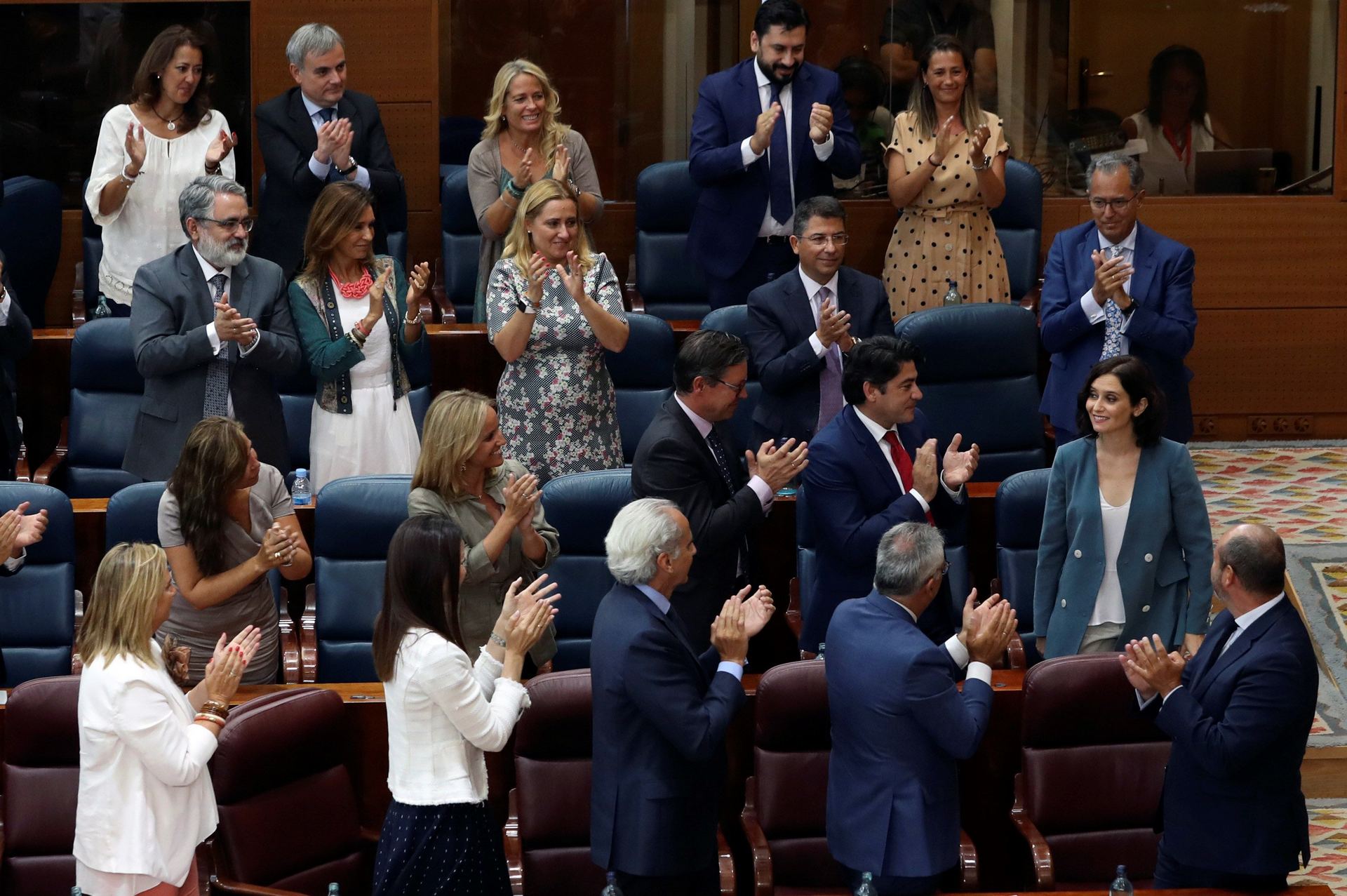 Ayuso finalizó su intervención con la ovación de PP y sin los aplausos del resto de bancadas, inlcuidos Cs y Vox.