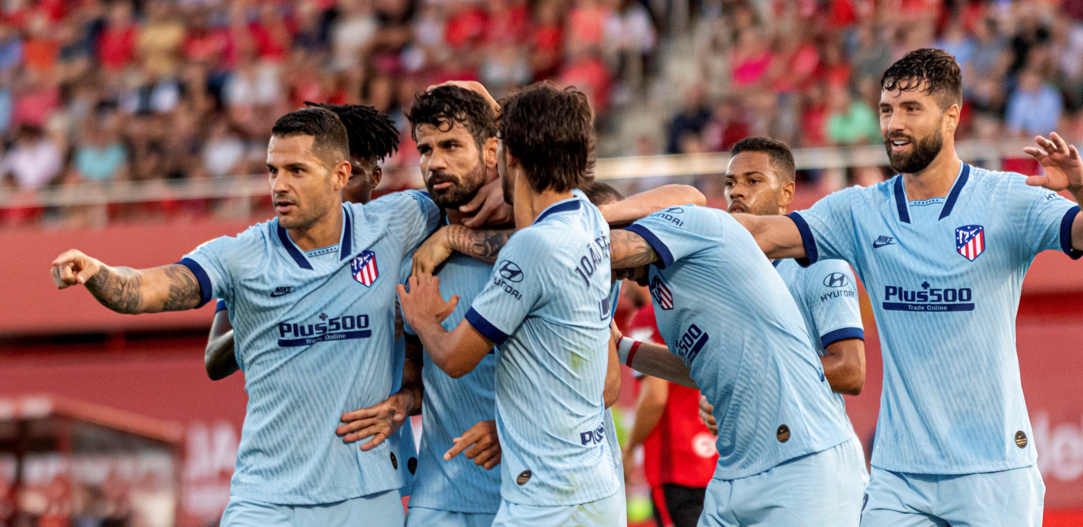 Los jugadores del Atlético de Madrid celebran el gol de Diego Costa anotado ante el Mallorca. / EFE