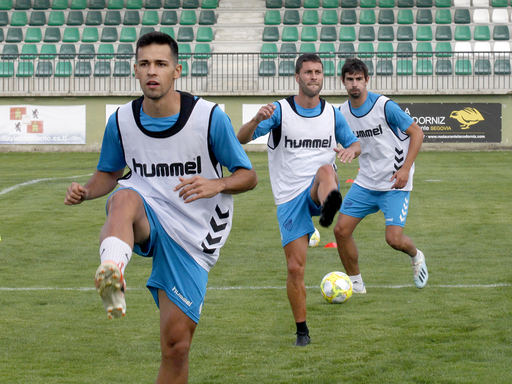 Diego Gómez, Manu y Javi Marcos, durante uno de los ejercicios. / NEREA LLORENTE
