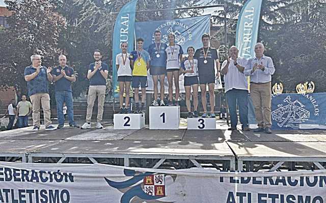 Podio de la categoría absoluta, tanto masculina como femenina, del Autonómico de la Milla./ FETACYL