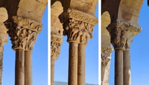 Capiteles con distintas escenas talladas en los arcos de la entrada porticada de la iglesia de San Miguel Arcángel.