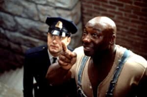 Espectro luminoso del cine 3 Tom Hanks y Michael Clarke Duncan en “La milla verde”, película de 1999.