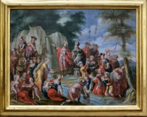 Moisés hace brotar el agua de la roca de Horeb.