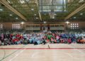 Foto de familia de los participantes en el Cuarto Encuentro de Deporte Adaptado que se llevó a cabo en el pabellón Pedro Delgado./ASPD