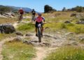 Ciclistas en pleno descenso durante una pasada edición de la Madrid-Segovia en MTB./ E.A.