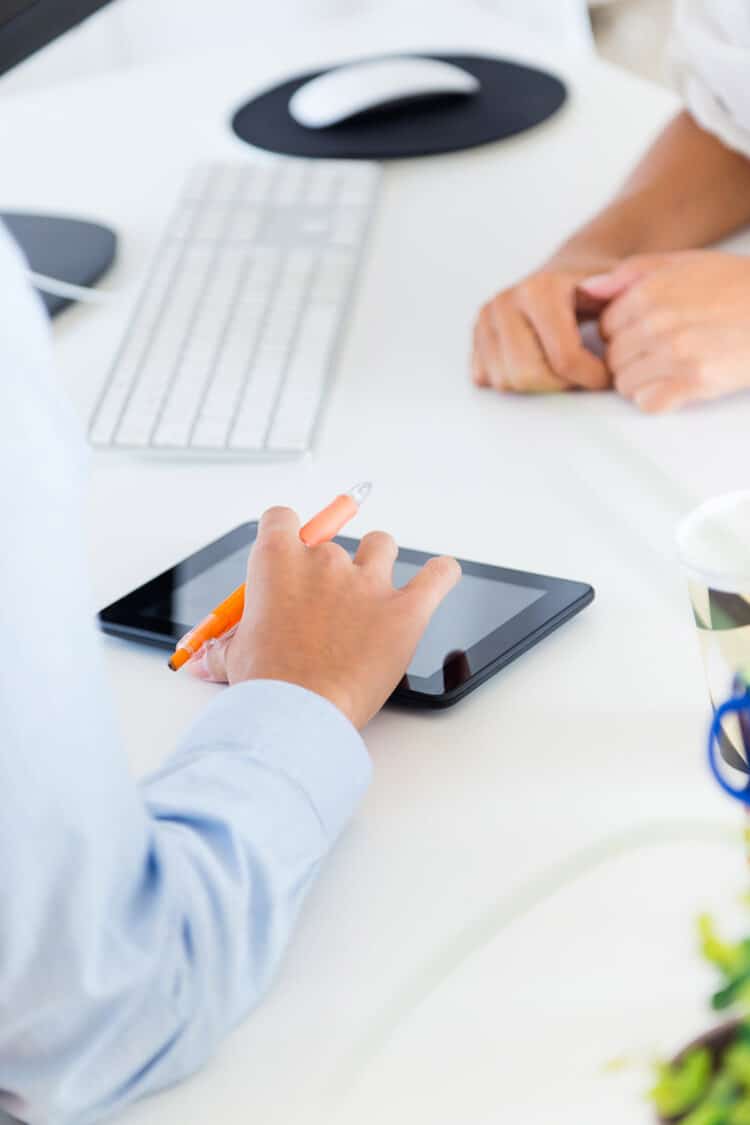 two business woman working office with digital tablet